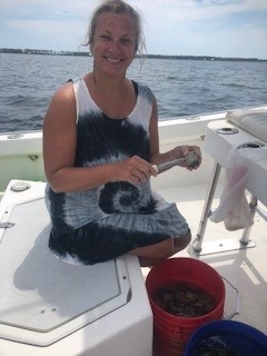 me shucking on boat