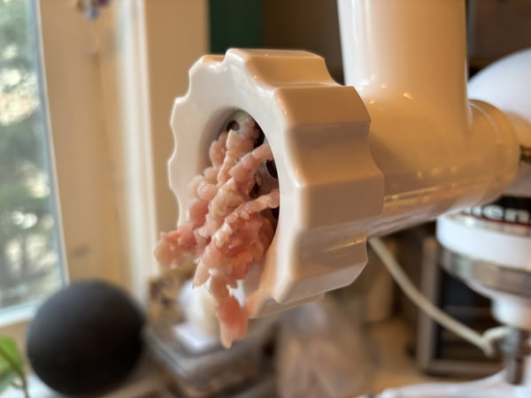 Meat in grinder
