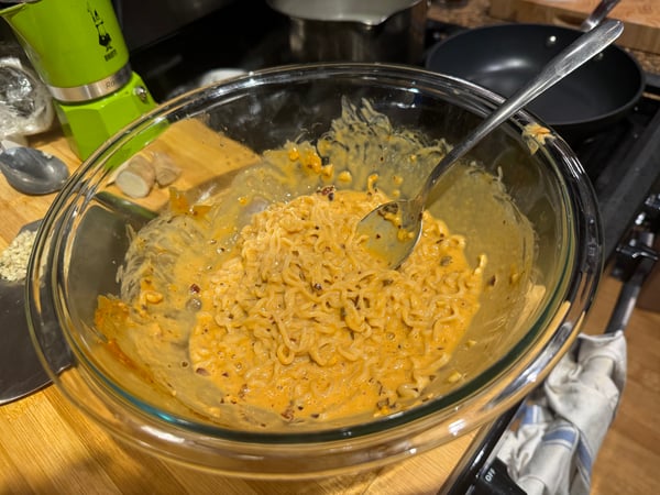 Noodles tossed in sauce