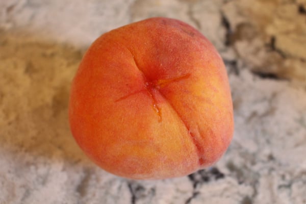 peach with x