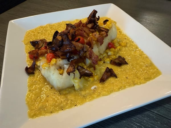 Plated fish with mushrooms