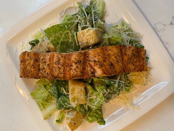 plated salmon caesar salad