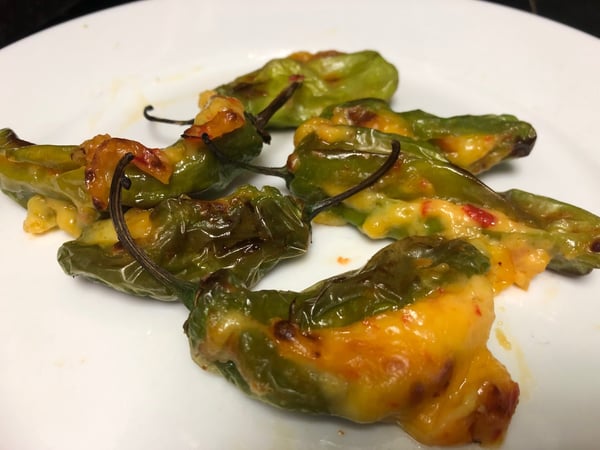 plated shishito stuffed peppers