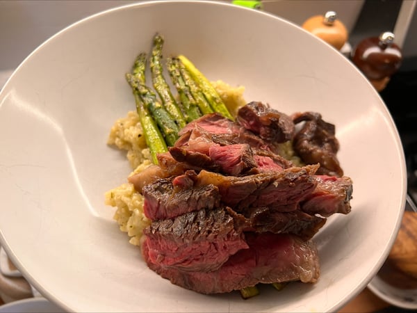 plated steak and asparagus
