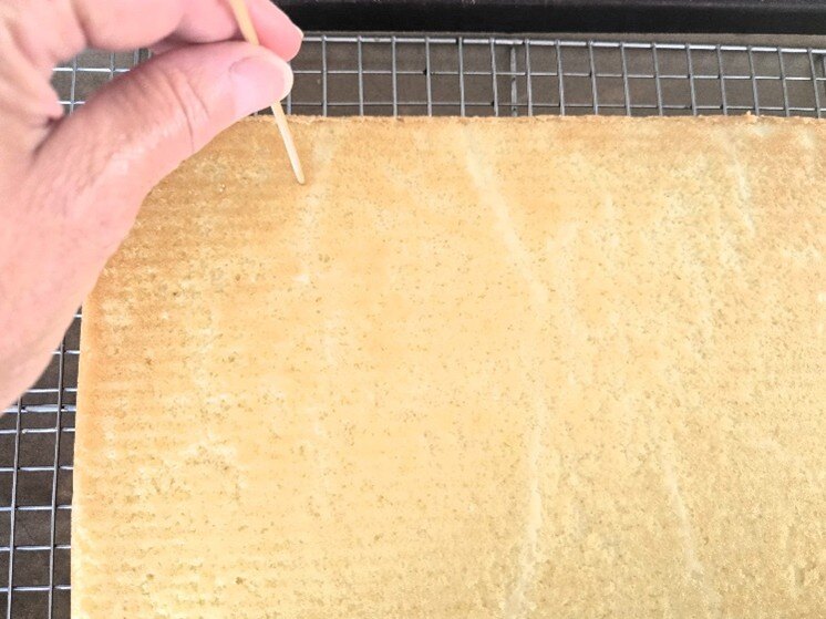 Poking holes in cake