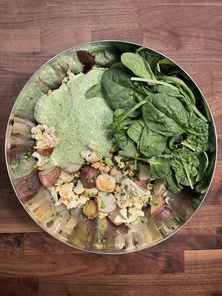 Potato salad with green feta and spinach