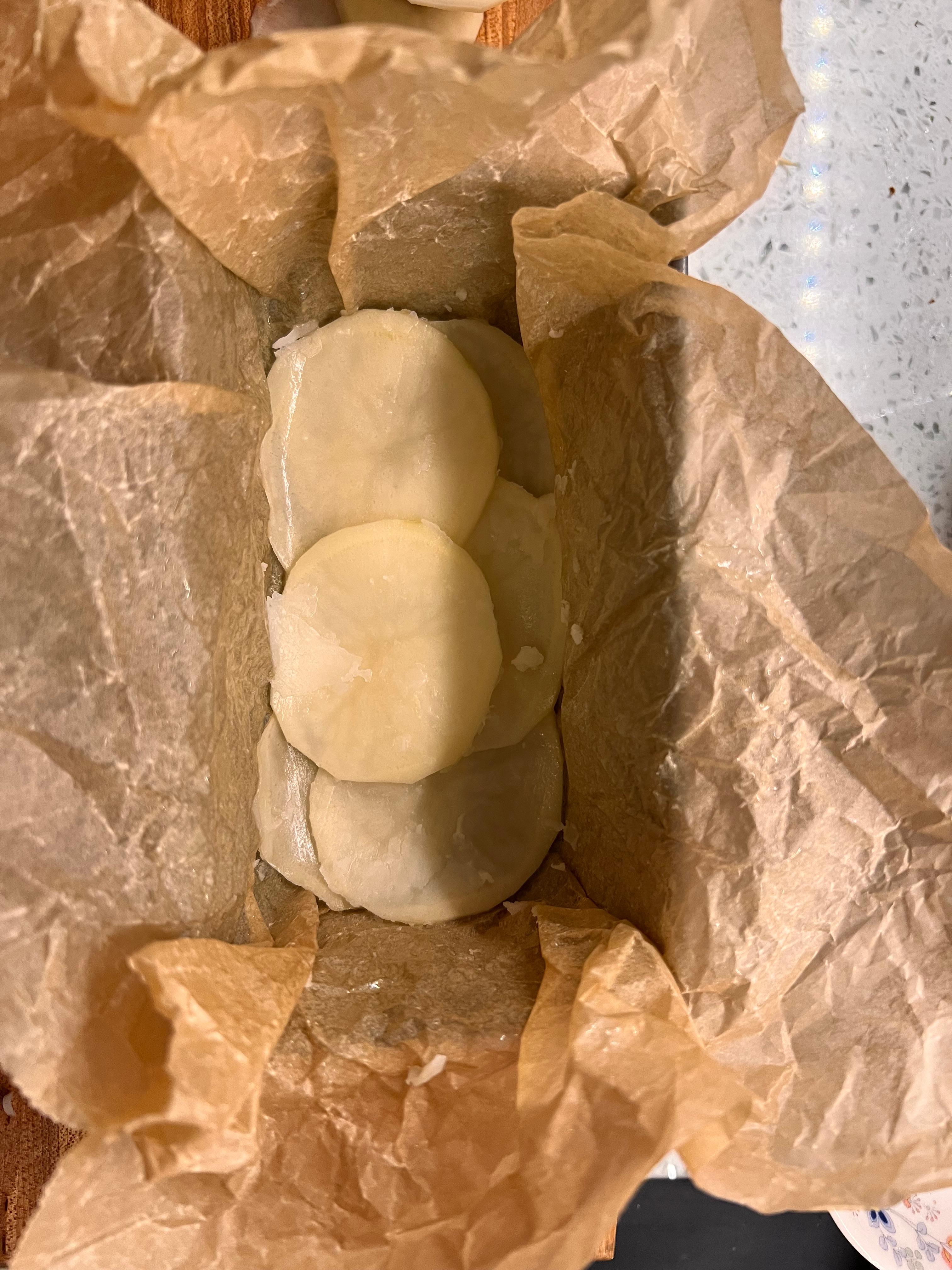 Potatoes in parchment lined pan