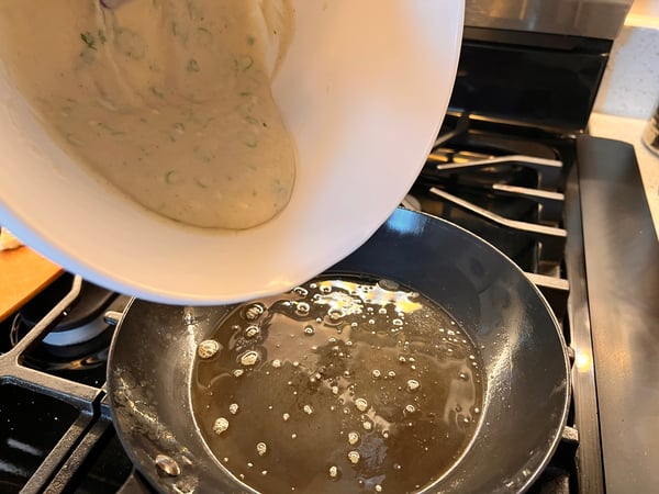 Pouring batter into pan