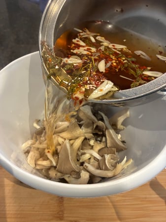 Pouring mushrooms