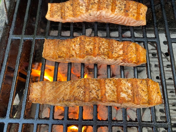 salmon flipped on grill