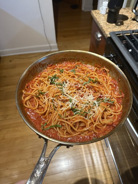 Pan with noodles and sauce