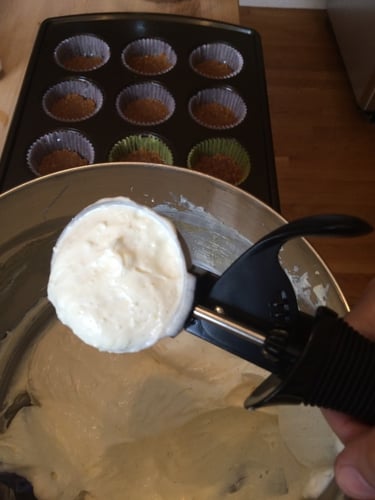 scooping cupcake batter