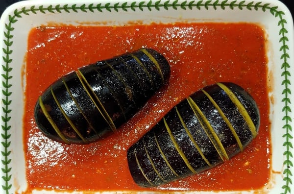 slit eggplants in sauce