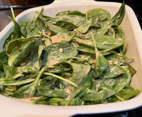 Spinach with sauce