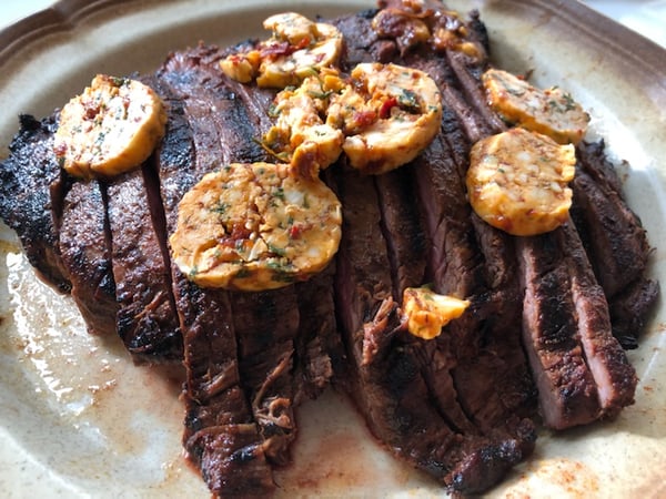 steak with butter coins