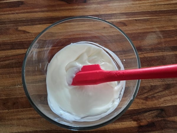 Stirring white chocolate