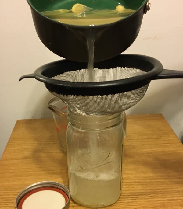 straining ginger tea