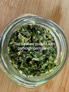 tea leaves pureed with garlic ginger cilantro