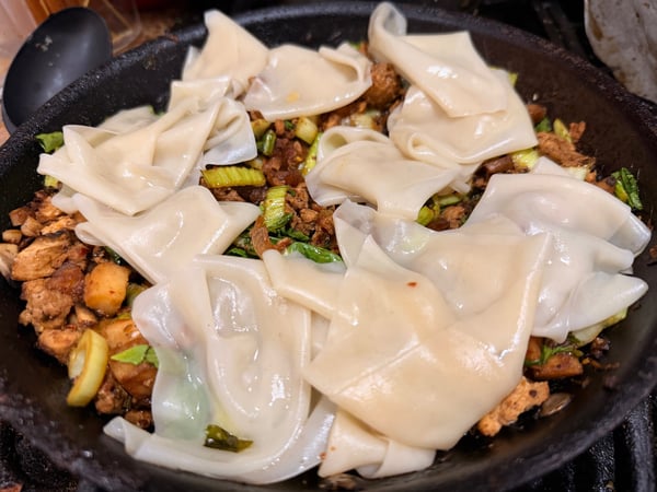 Wrappers on top of chicken