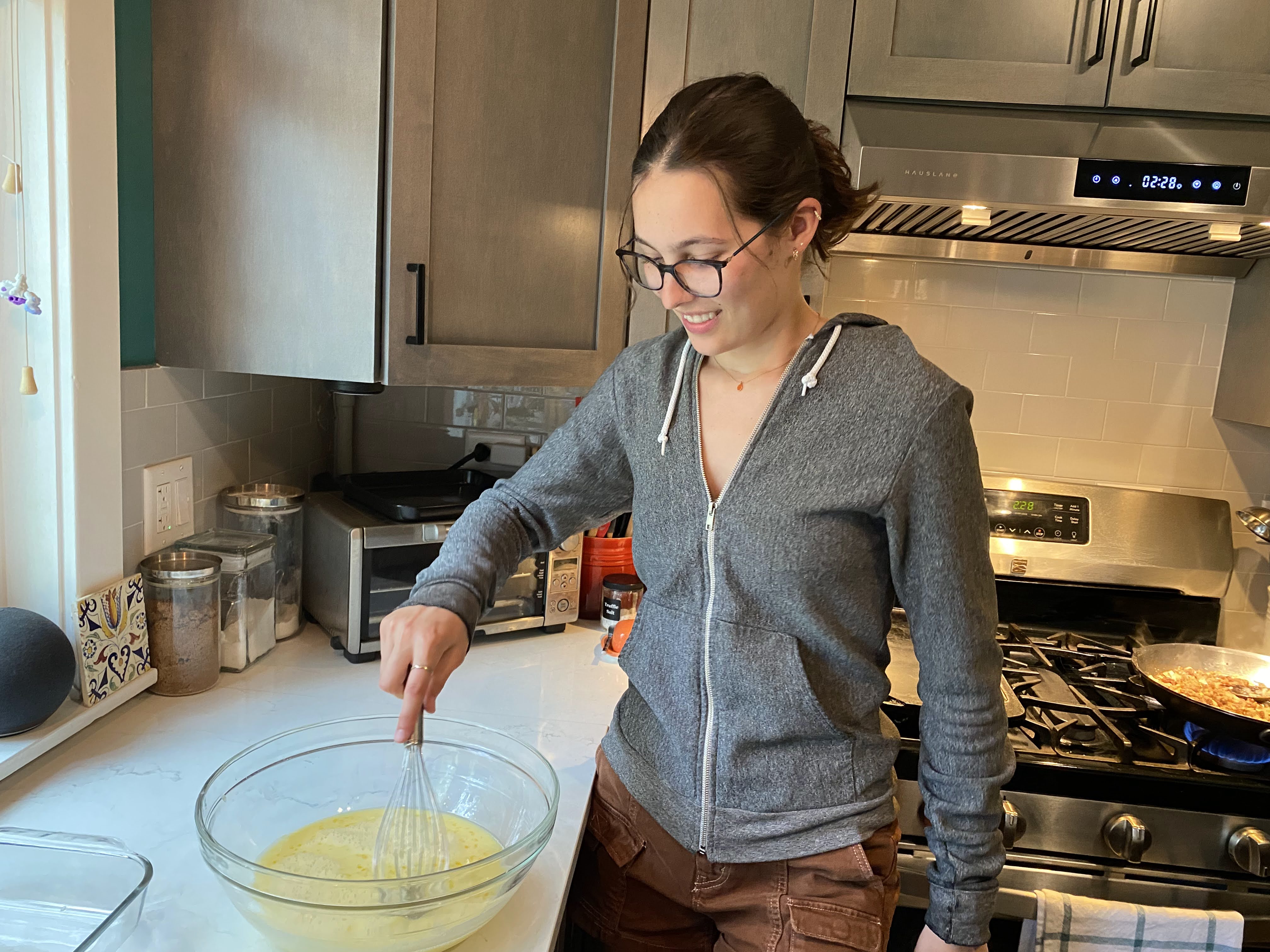 Delilah whisking eggs