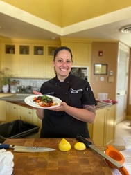 Lisa with carrot dish