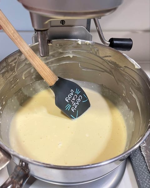 Mixing cheesecake batter