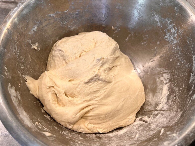 Stretched dough in bowl