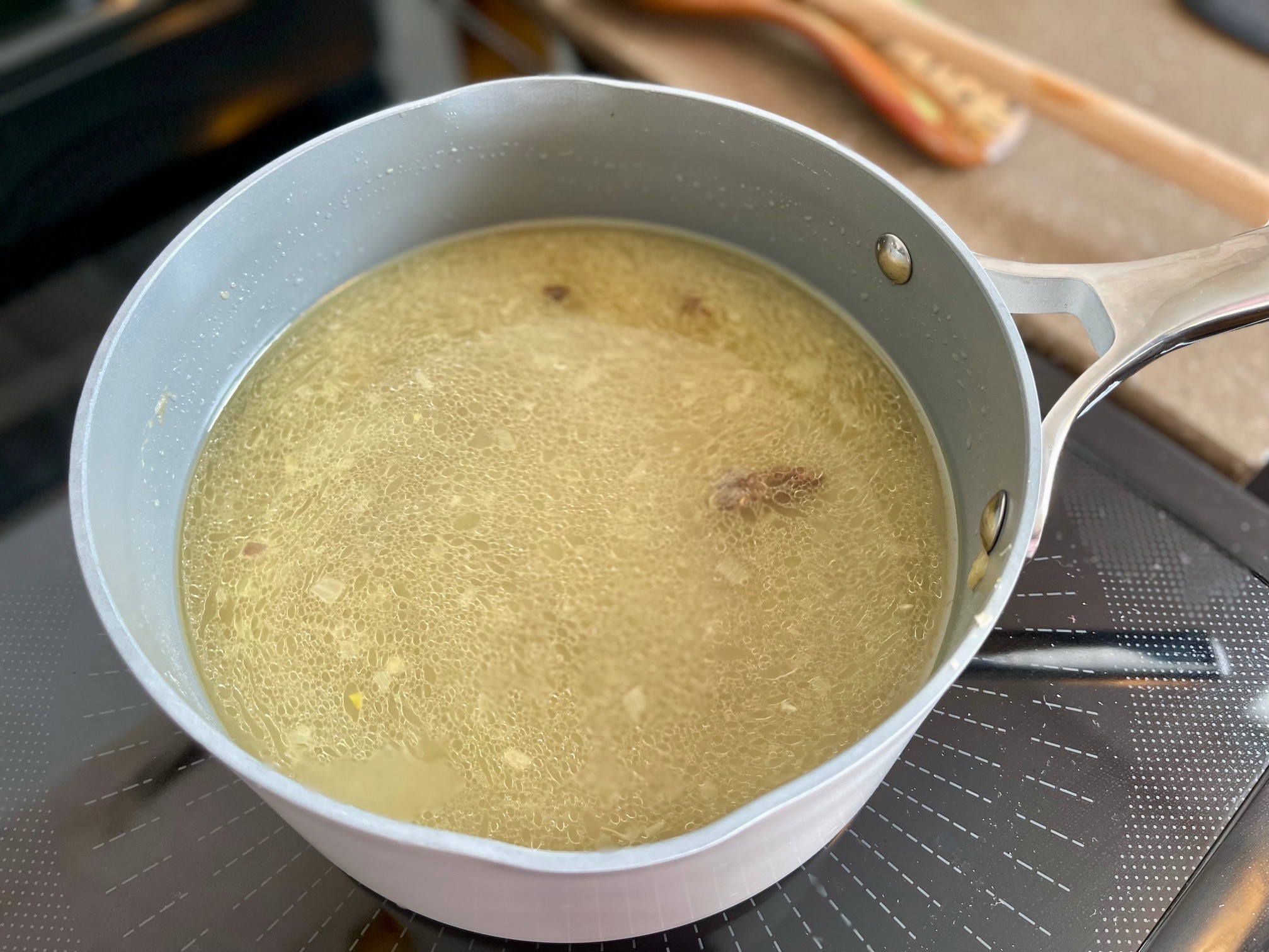 Adding chicken stock
