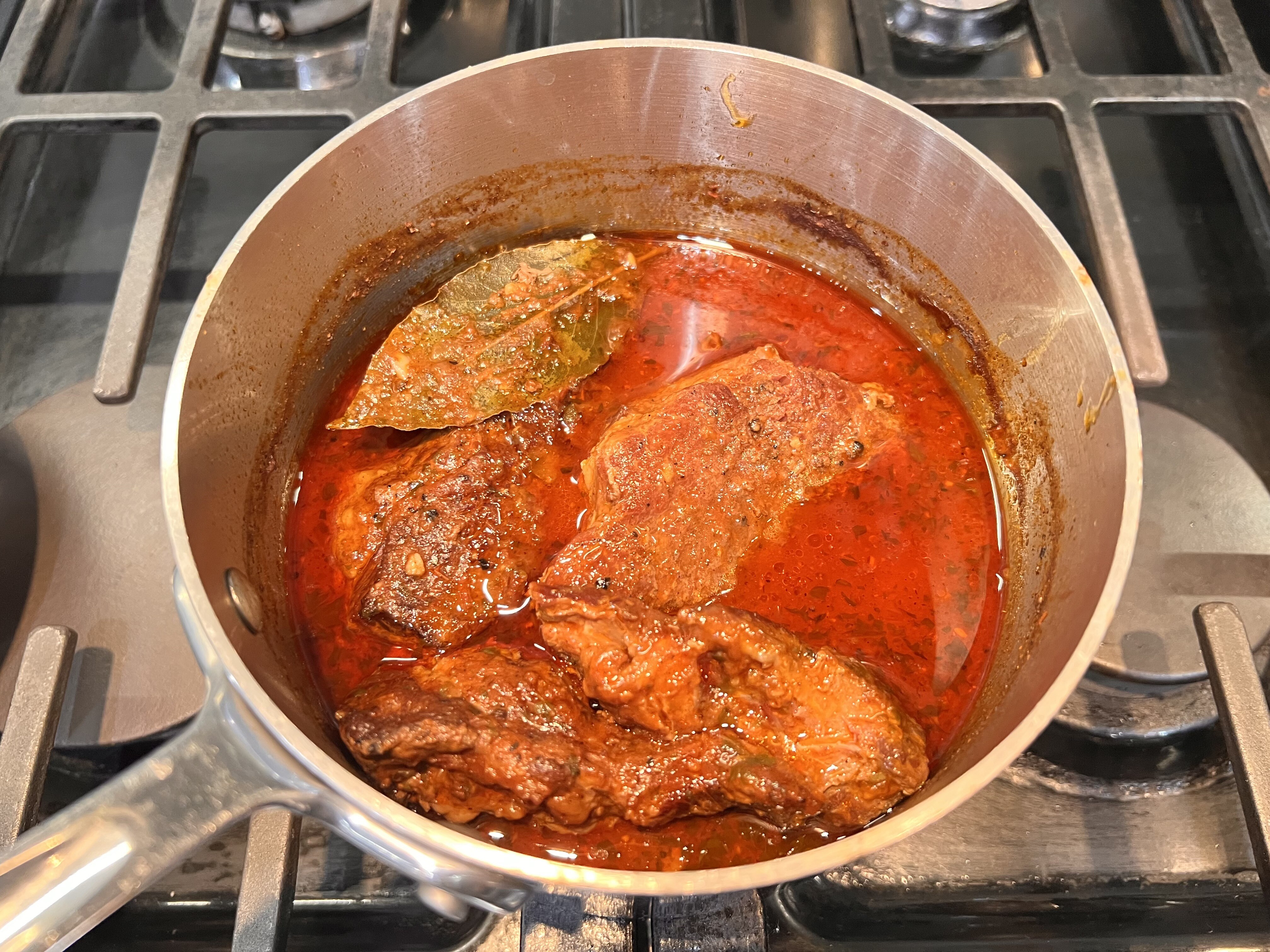 Meat in pot for braise