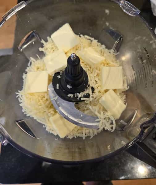 Butter and cheese in food processor