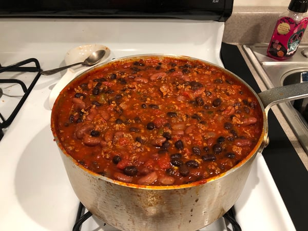 chili simmers with more beans