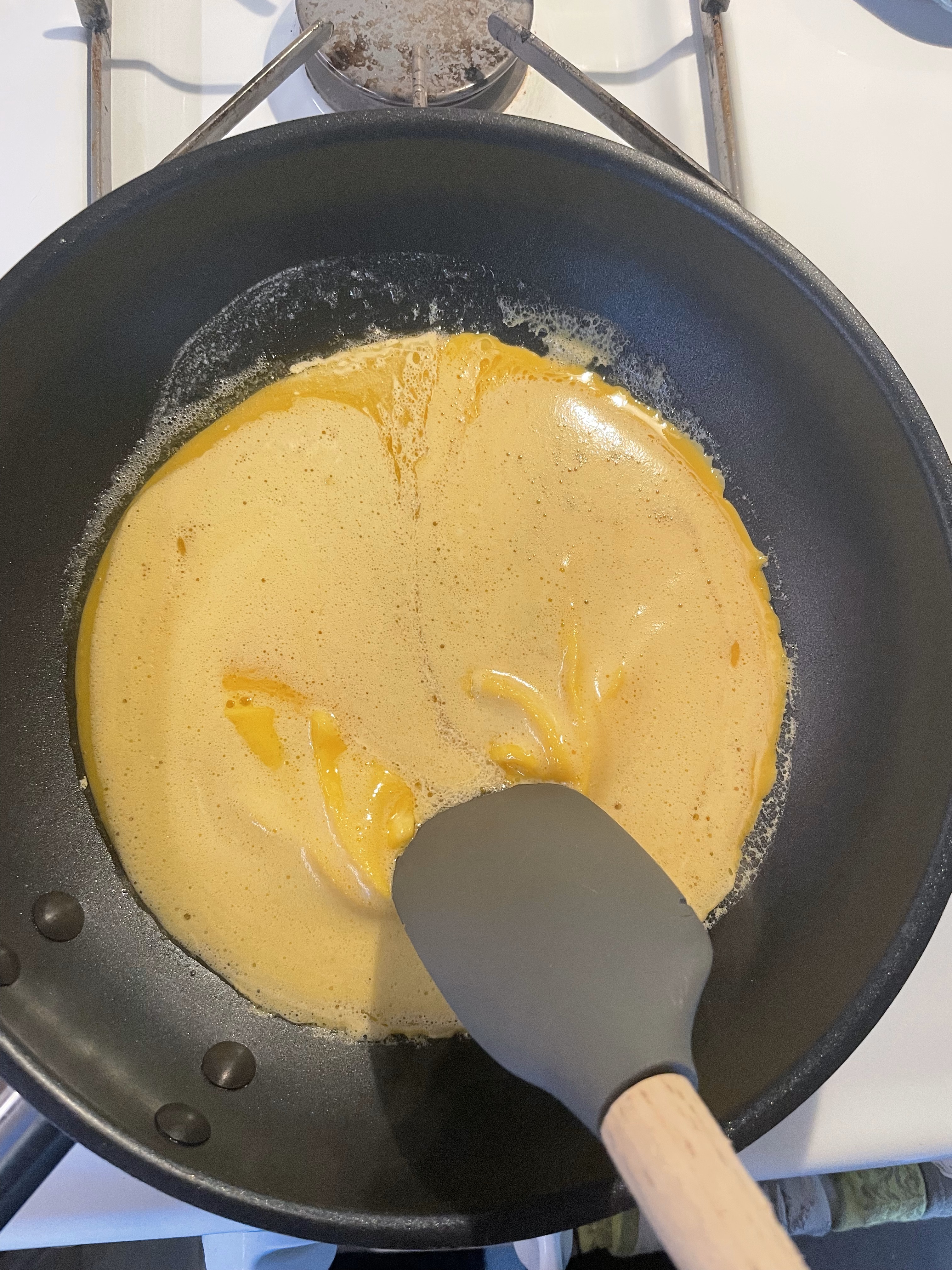 Rubber spatula in eggs