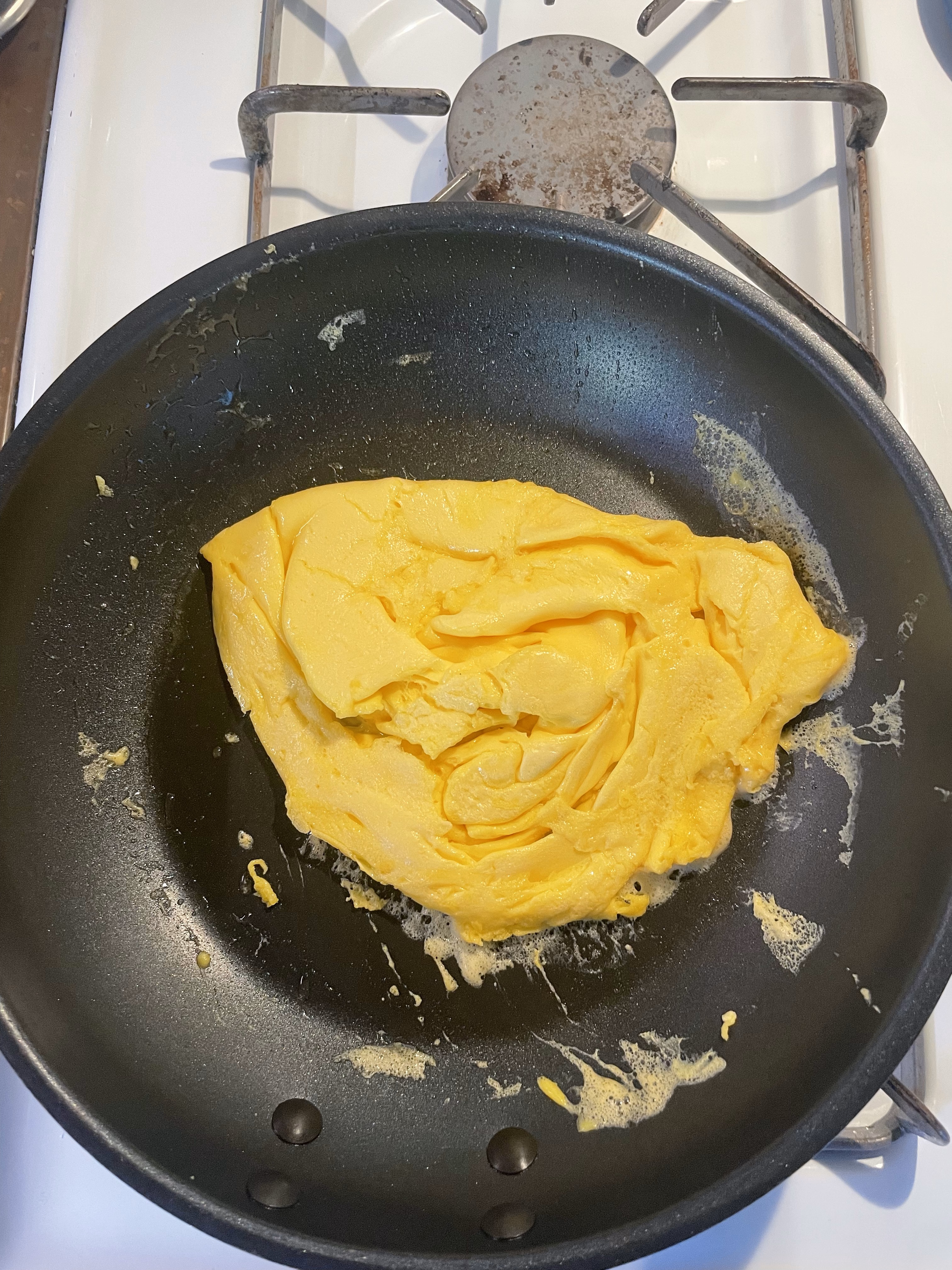 Flipping scrambled eggs