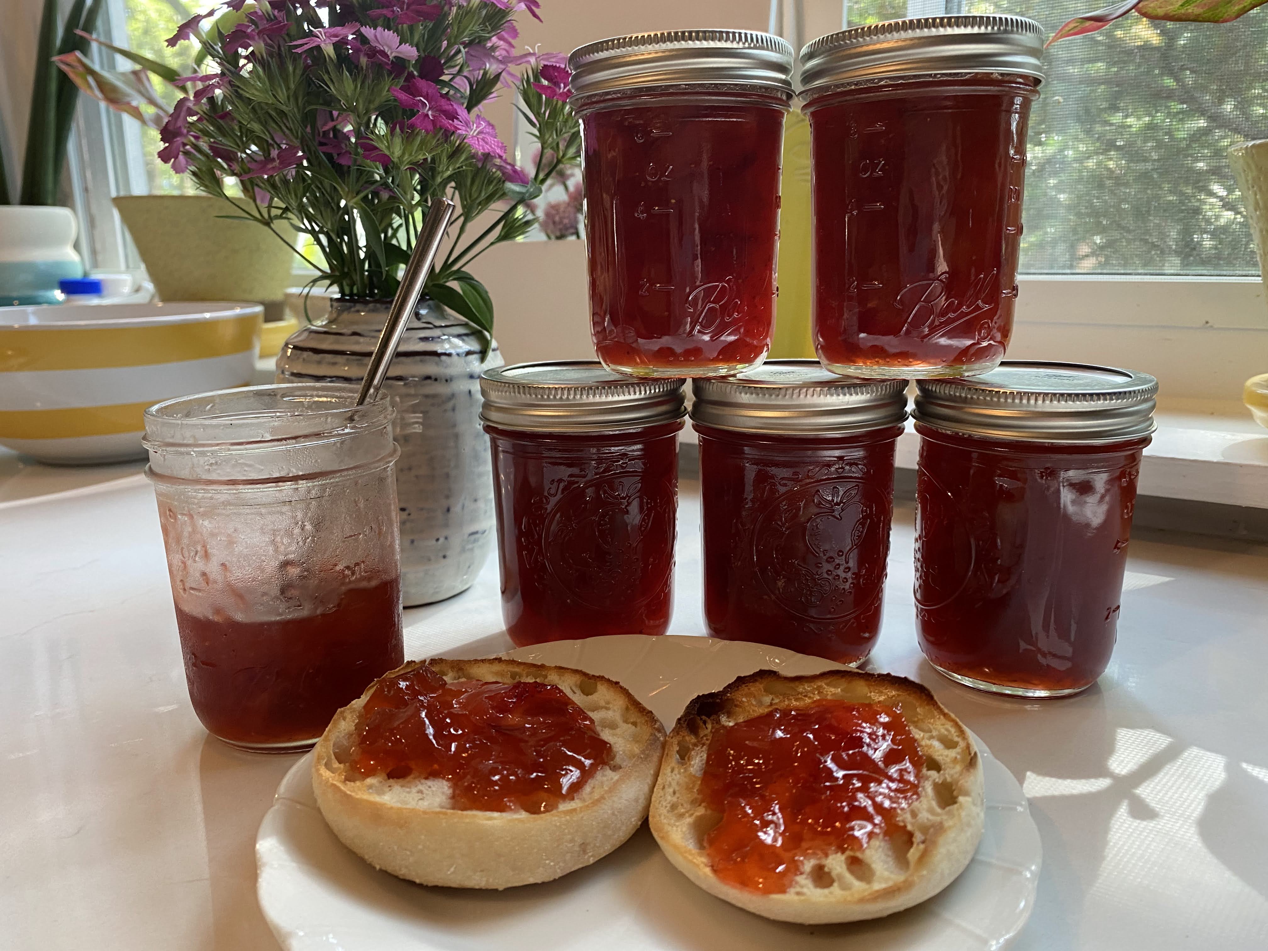 Jars of jam with English muffin