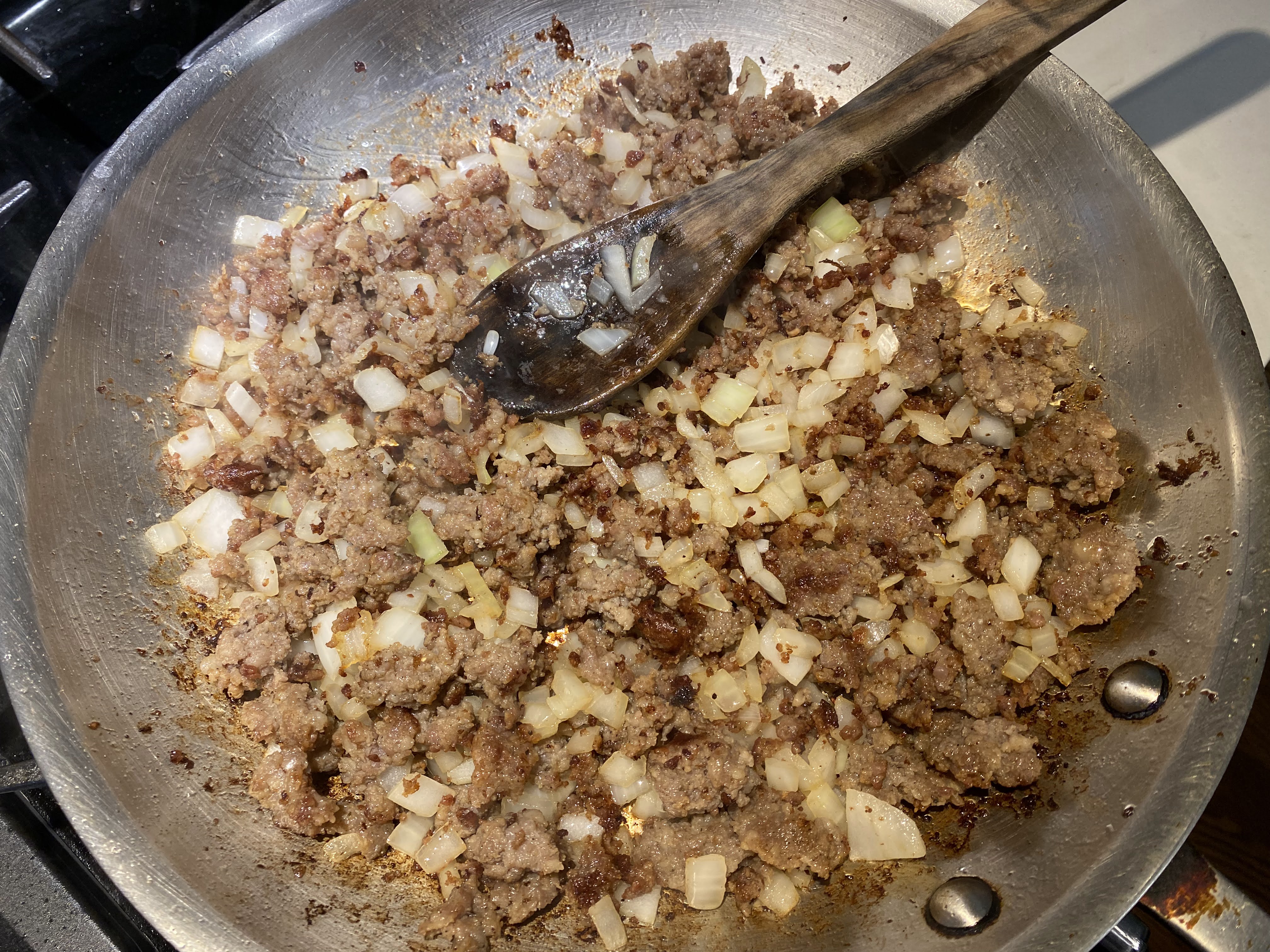 Cooking meat and onions
