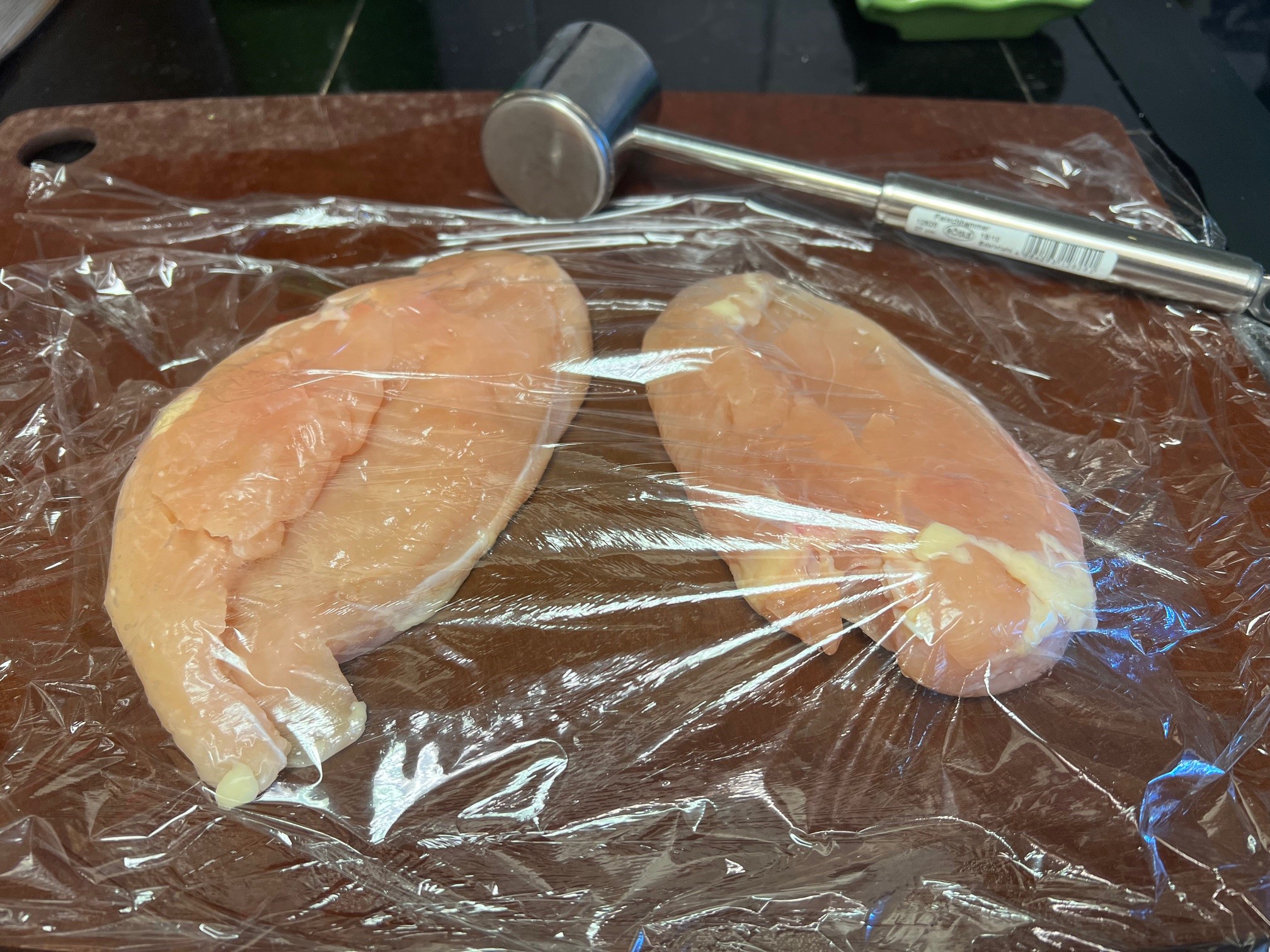 Preparing chicken for pounding