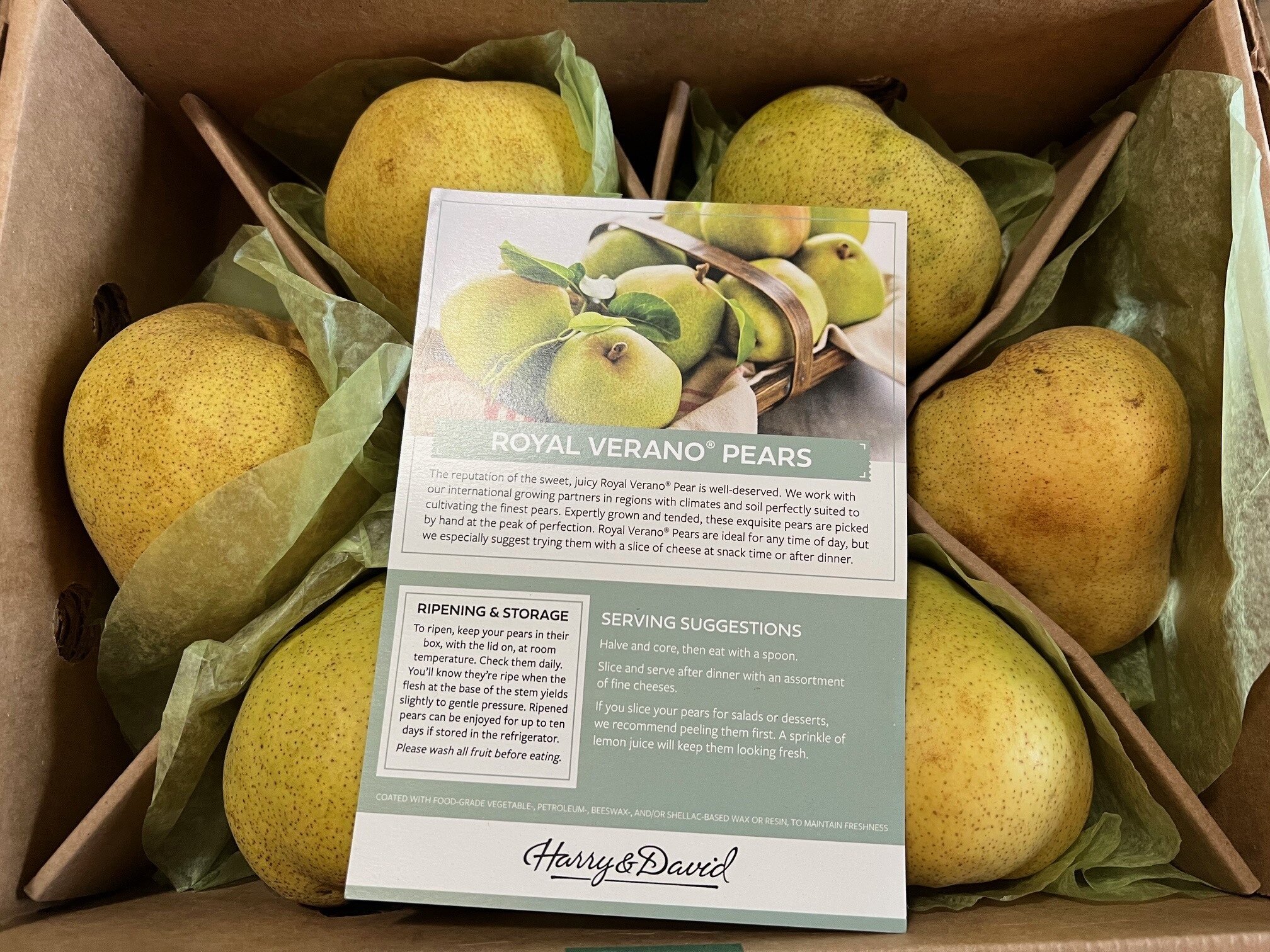 Ripe pears in box