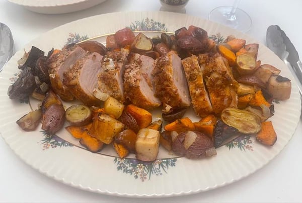 Plated pork and veggies
